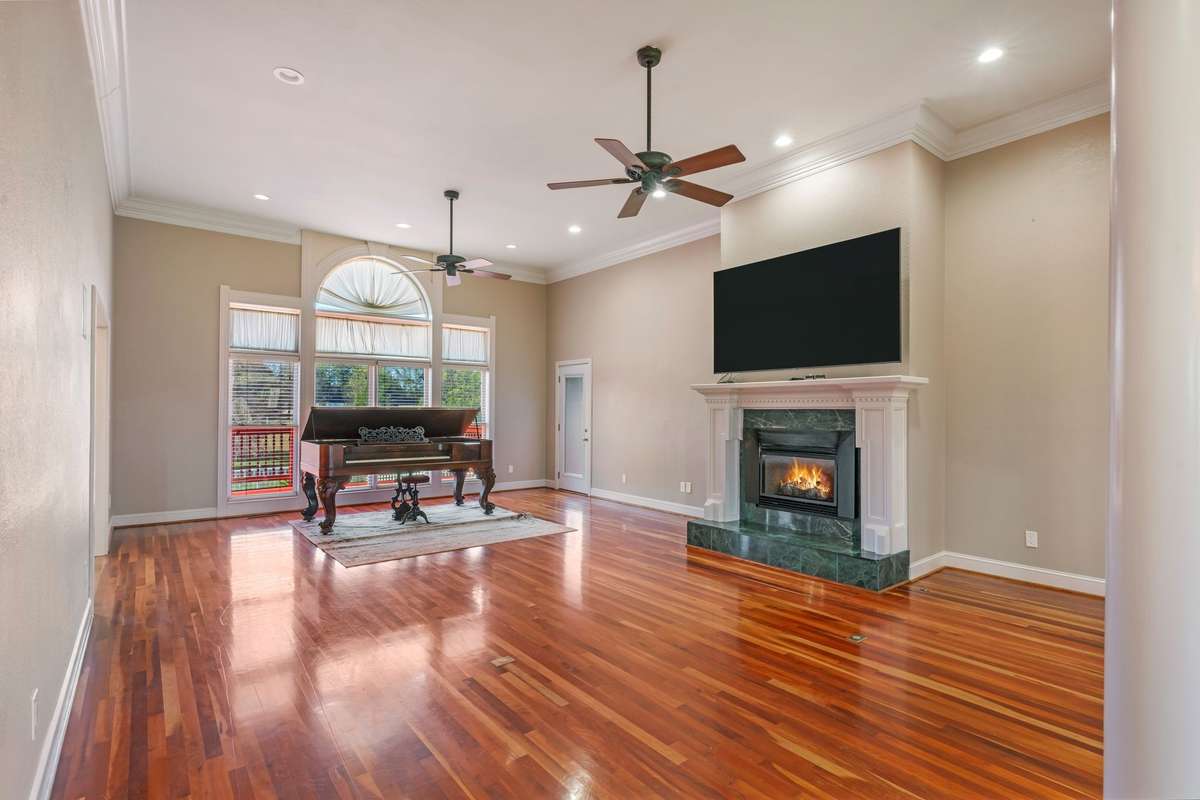 Large open living space featuring a 19th Century Piano (all documentation on piano will be provided).