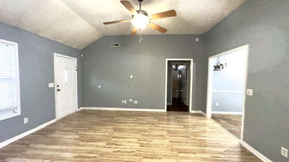 living room with high ceiling