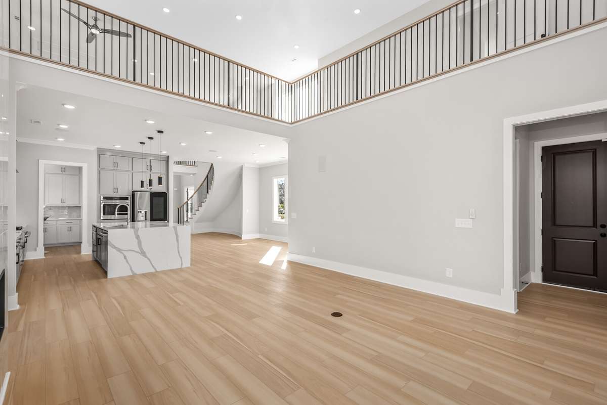 View of kitchen and upstairs Den from the Family / Living room