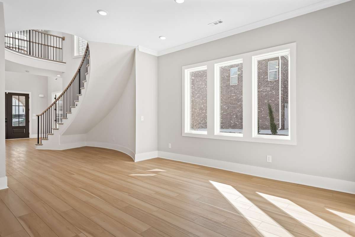 3 Large windows flood the dining area and kitchen with lots of natural light