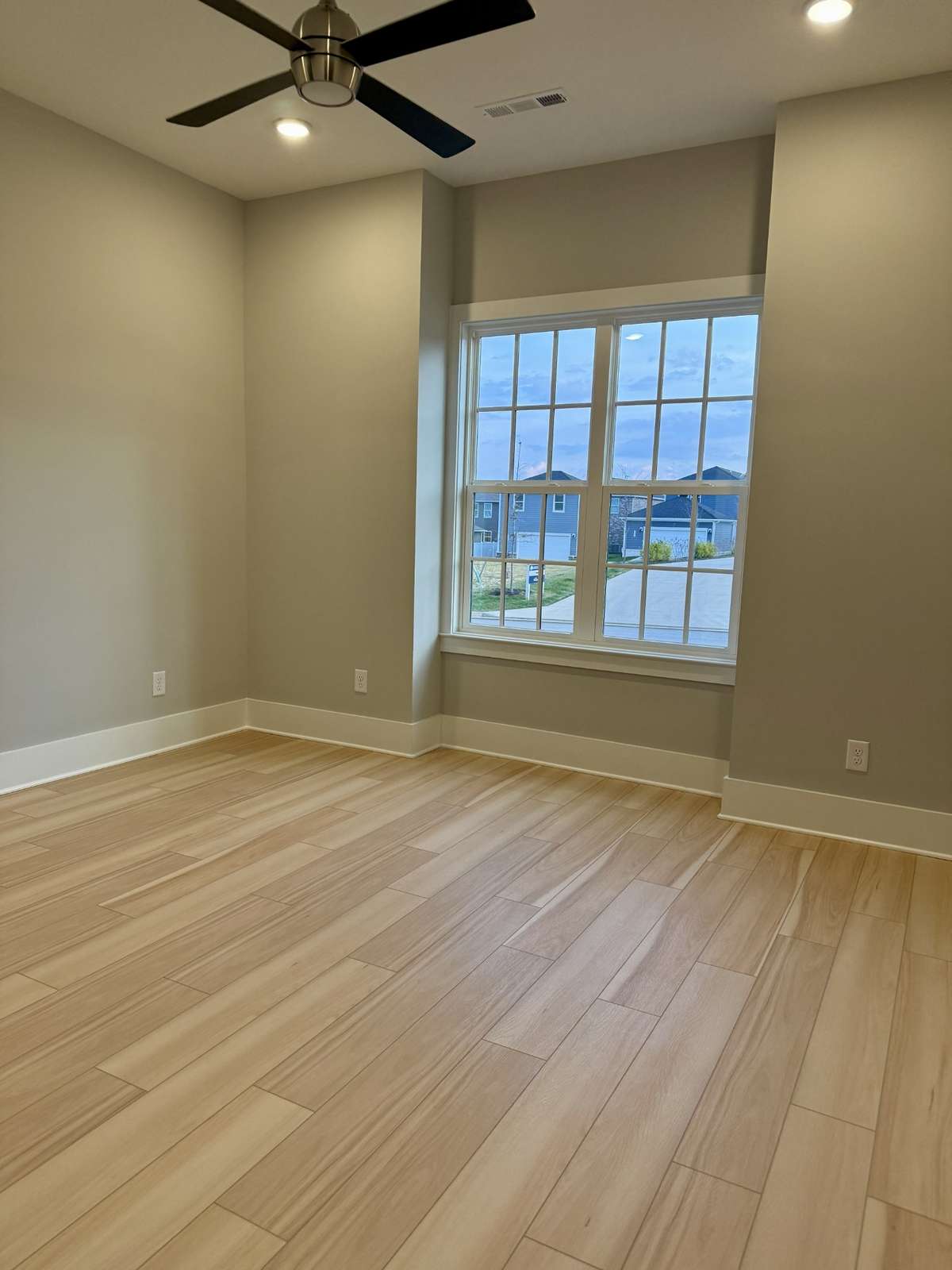 Secondary bedroom on the main level across from the Flex room