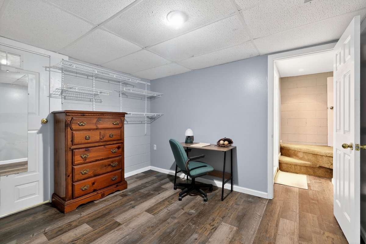Downstairs bedroom 3 office with walk in closet.