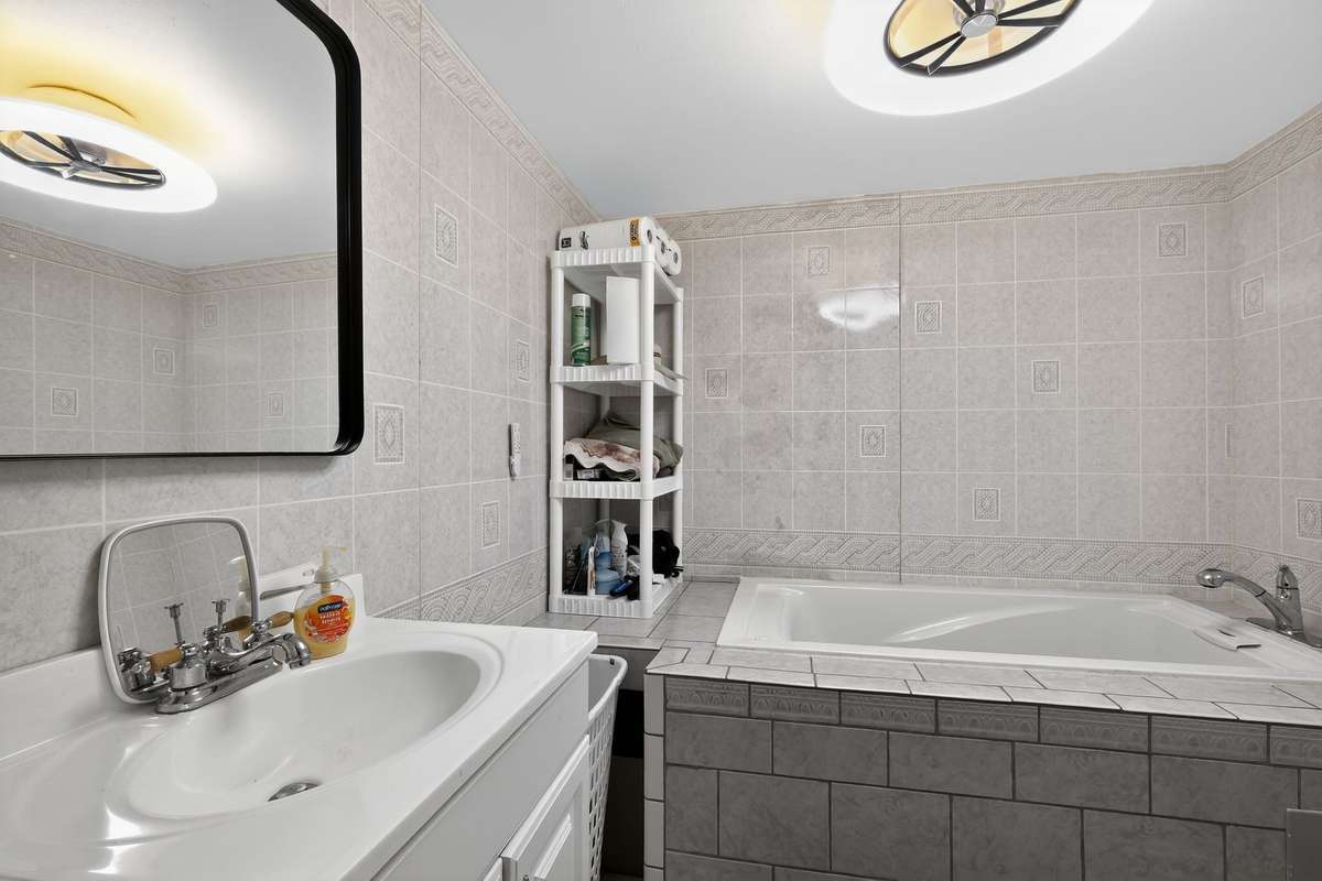 Downstairs bathroom 1 has large soaking tub