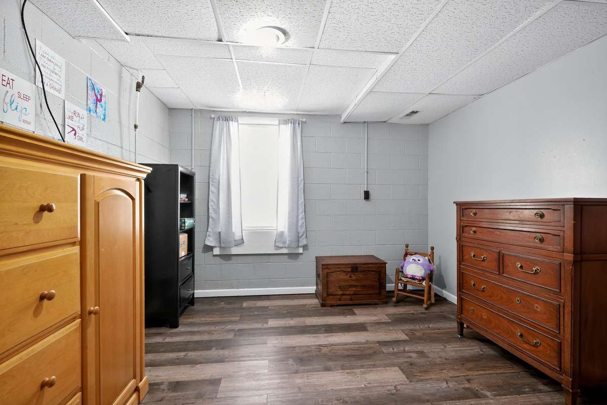 Downstairs bedroom 3 with connected office and walk in closet.