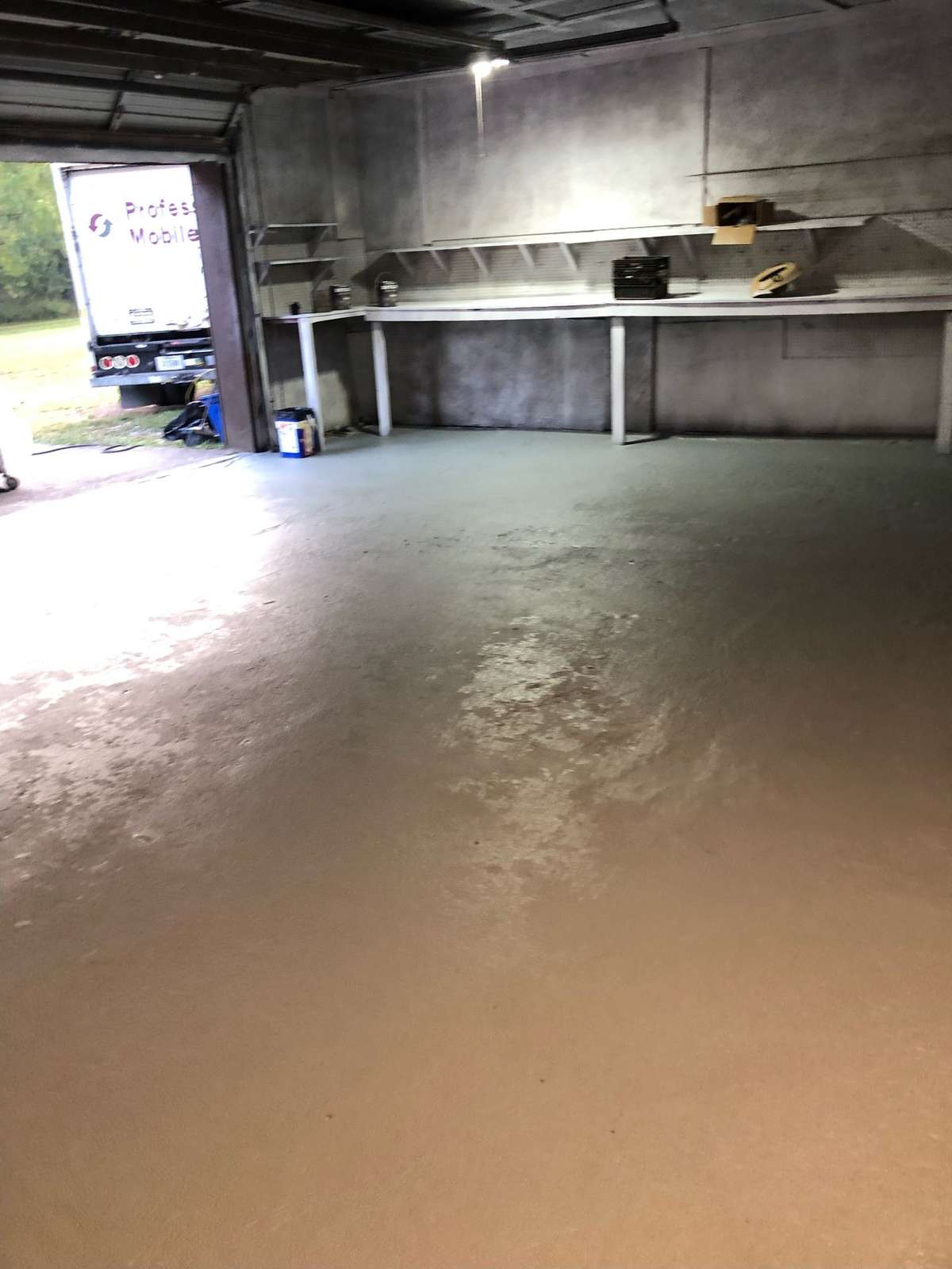 Inside of the garage--plenty of space to park and for storage.