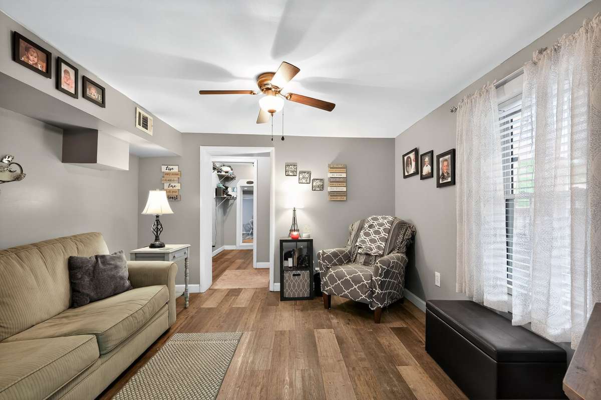 Front sitting room also has fresh neutral paint and upgraded flooring.