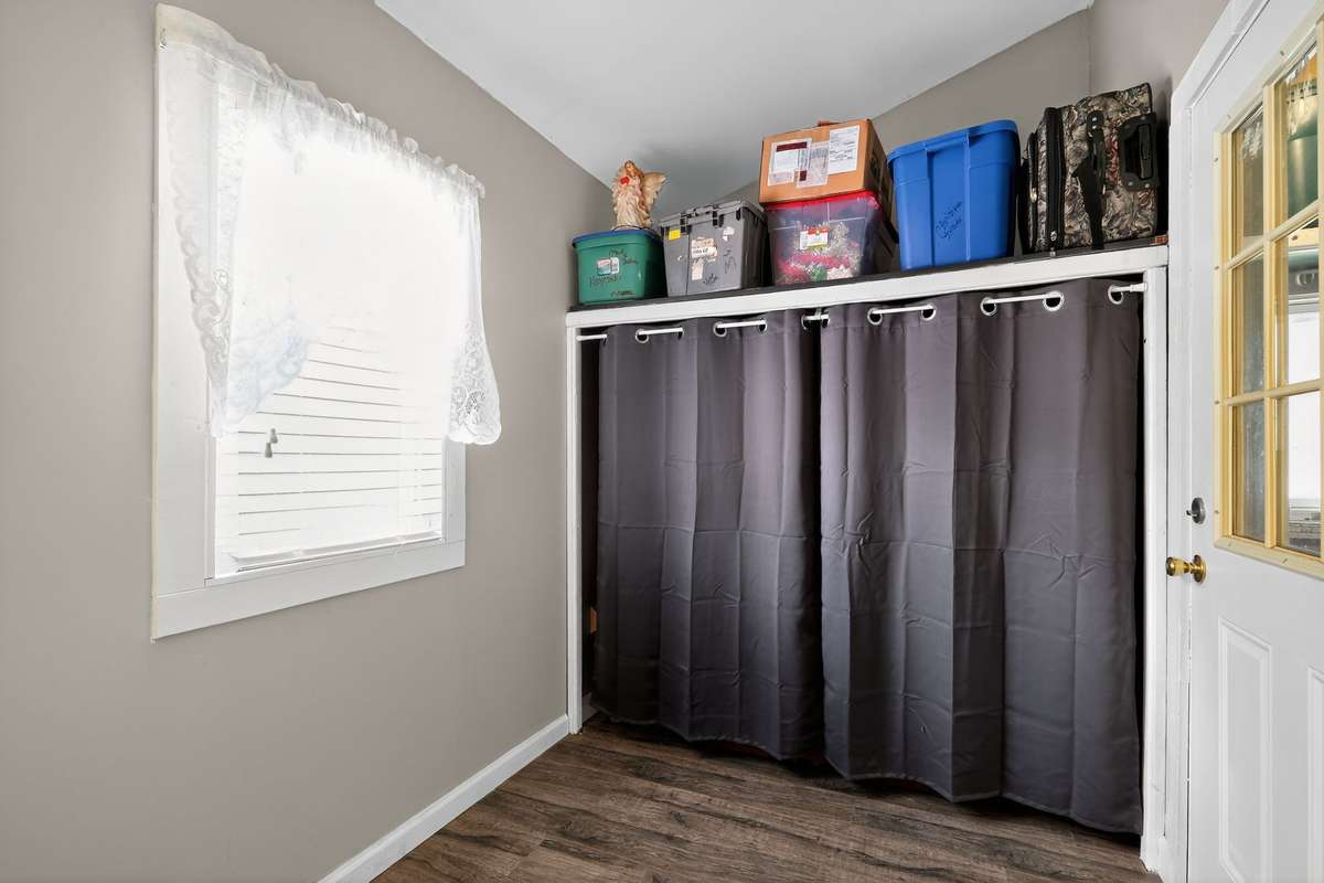 Upstairs bedroom 1 has spacious half bath with plenty storage (toilet and sink not pictured but on opposite walls).