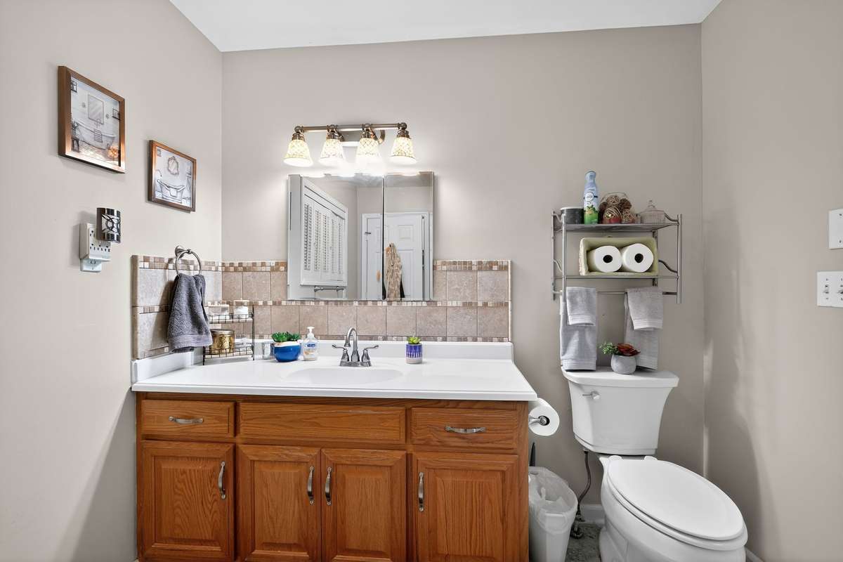 Large vanity in upstairs bathroom with plenty storage