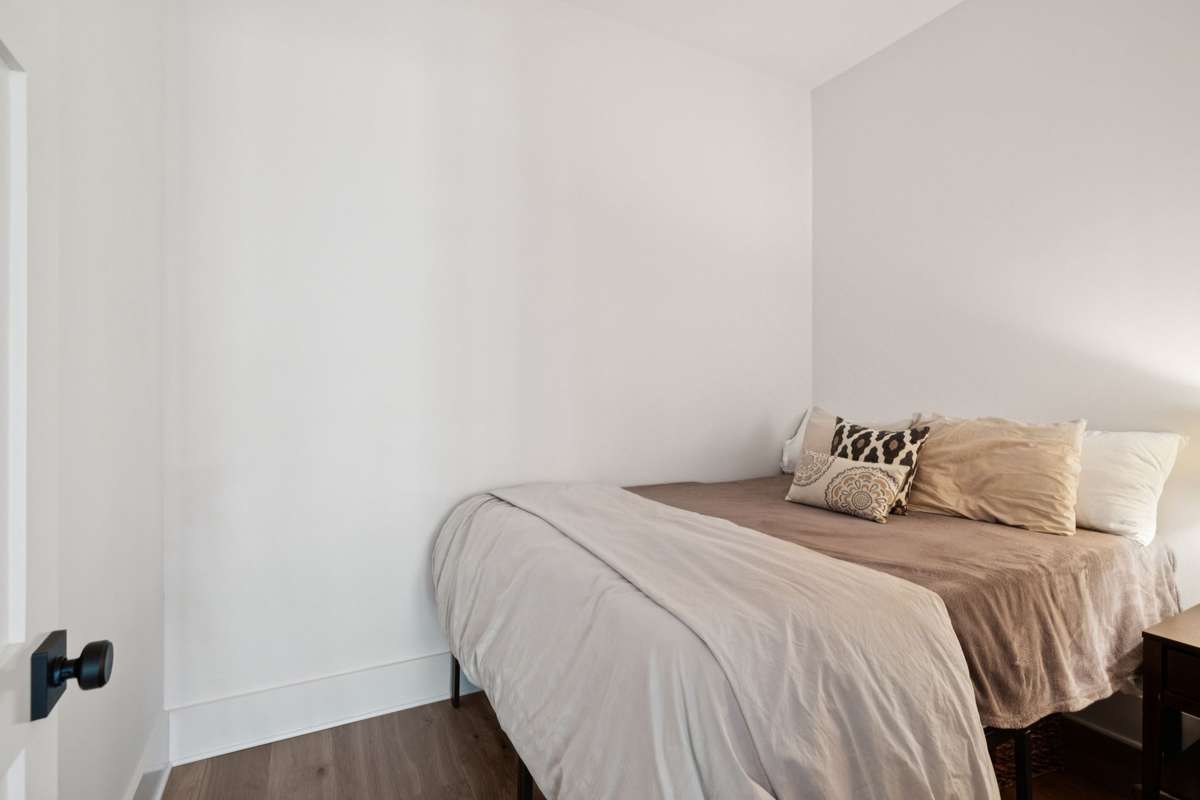 Currently used as a guest room, this room located in the basement would make for tremendous storage, a crafting room or an additional office.