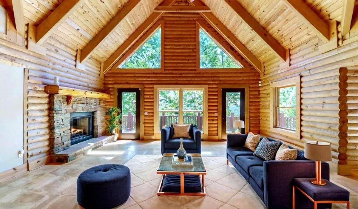 This virtually staged living room is only one of many way to decorate this amazing open floorplan, with vaulted ceilings and massive windows, highlighting the scenic views.