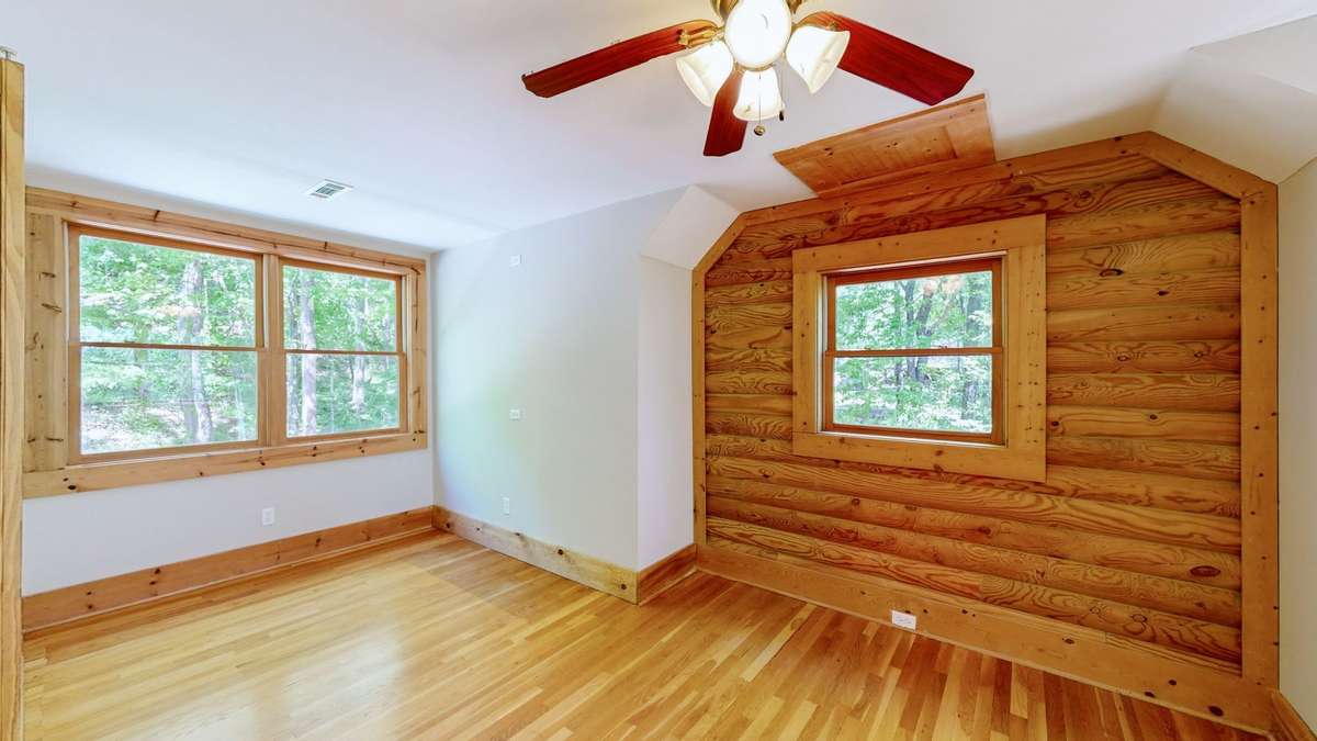 Second floor bedroom #1 offers ample space for queen suite, double bunkbeds, or double murphy beds.