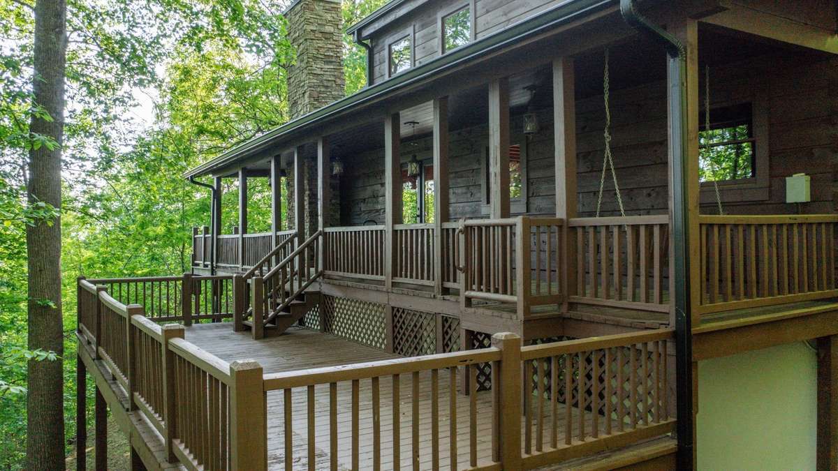 Lower level deck perfect for additional outdoor seating, hot tub or outdoor bar