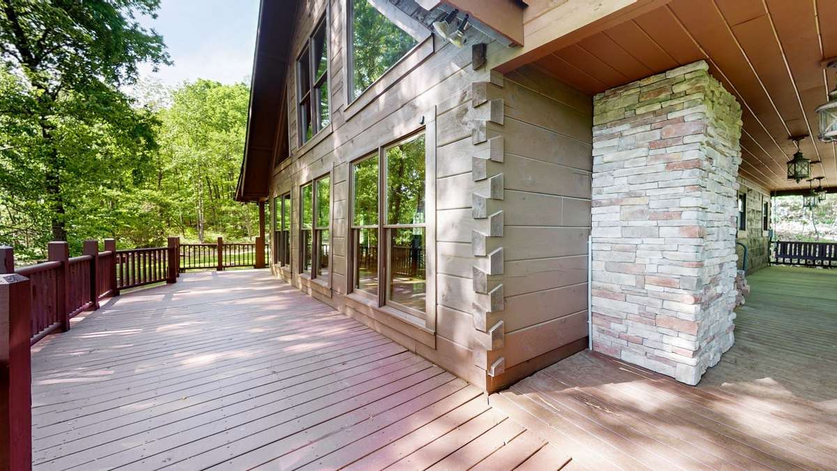 A multi-level wraparound deck with limitless options.  relax with a bottle of wine and enjoy the sunset. Install a hot tub for relaxing fall evenings.  Gather the family around the out door table for treetop dining!