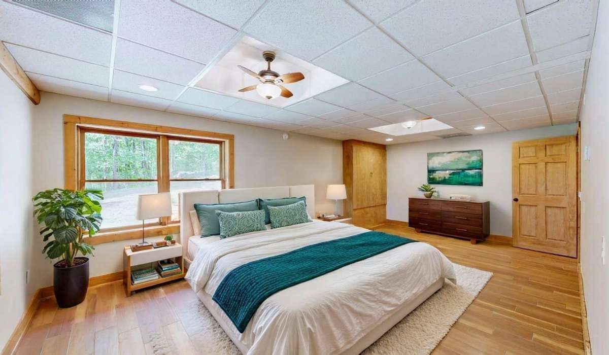 Another virtually staged room with direct access to bathrooms.  Perfect for large downstairs suite for in-laws or teenagers.  Direct access to exterior for patio hot tub or lower level adventure.