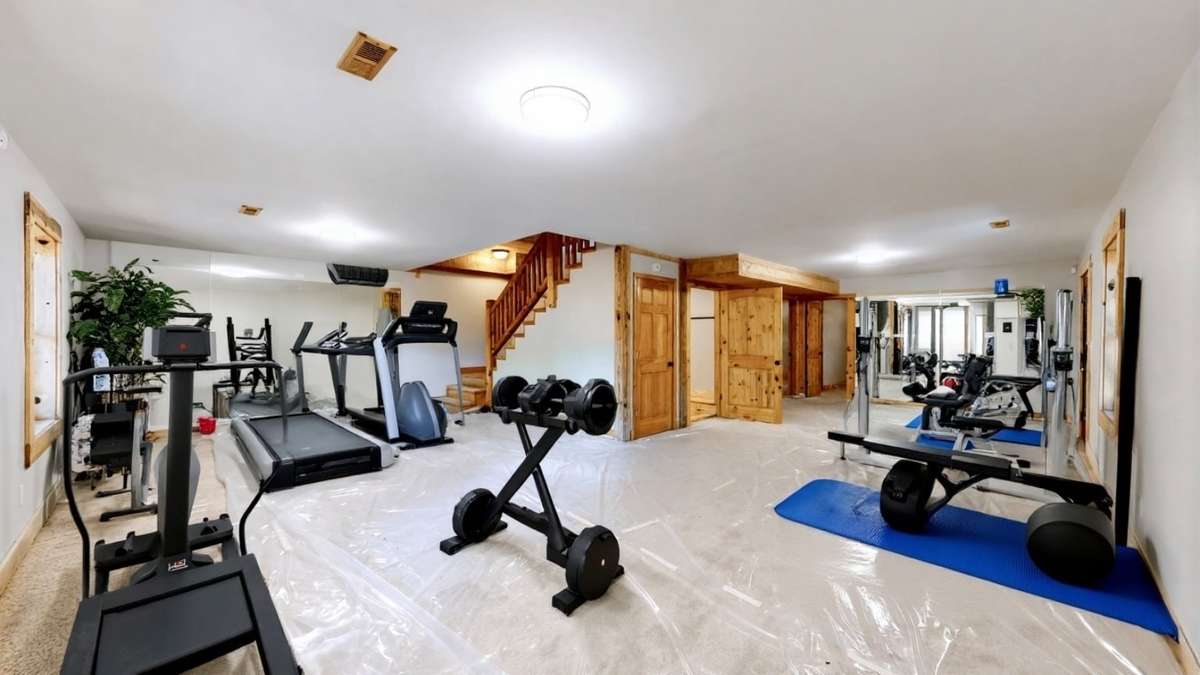Much like the rest of the cabin, the massive basement offers limitless options.  The virtually staged gym is one use of the large space.