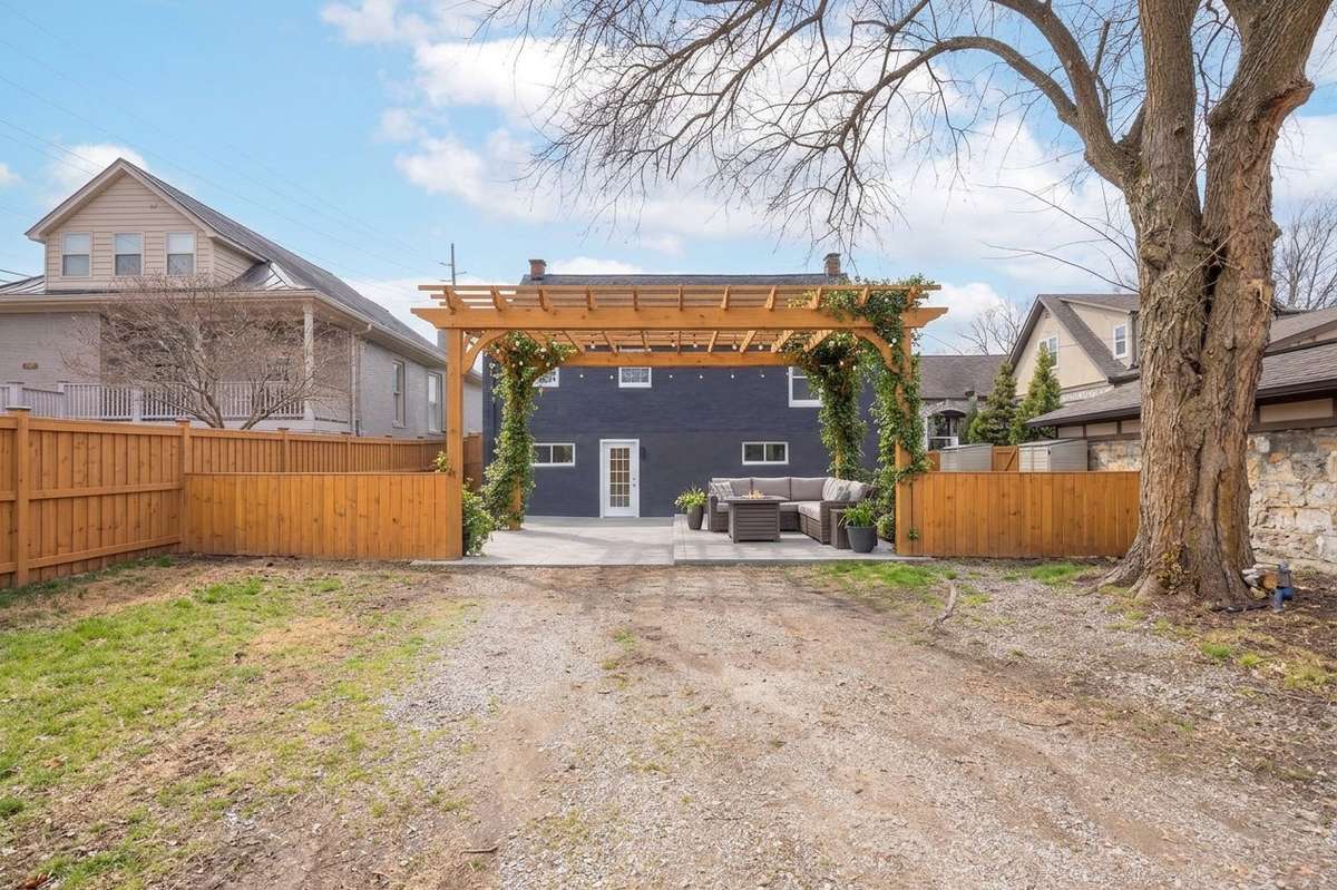This is a rendering of the back from the open lot that does not convey with the property but showing the line of the property.