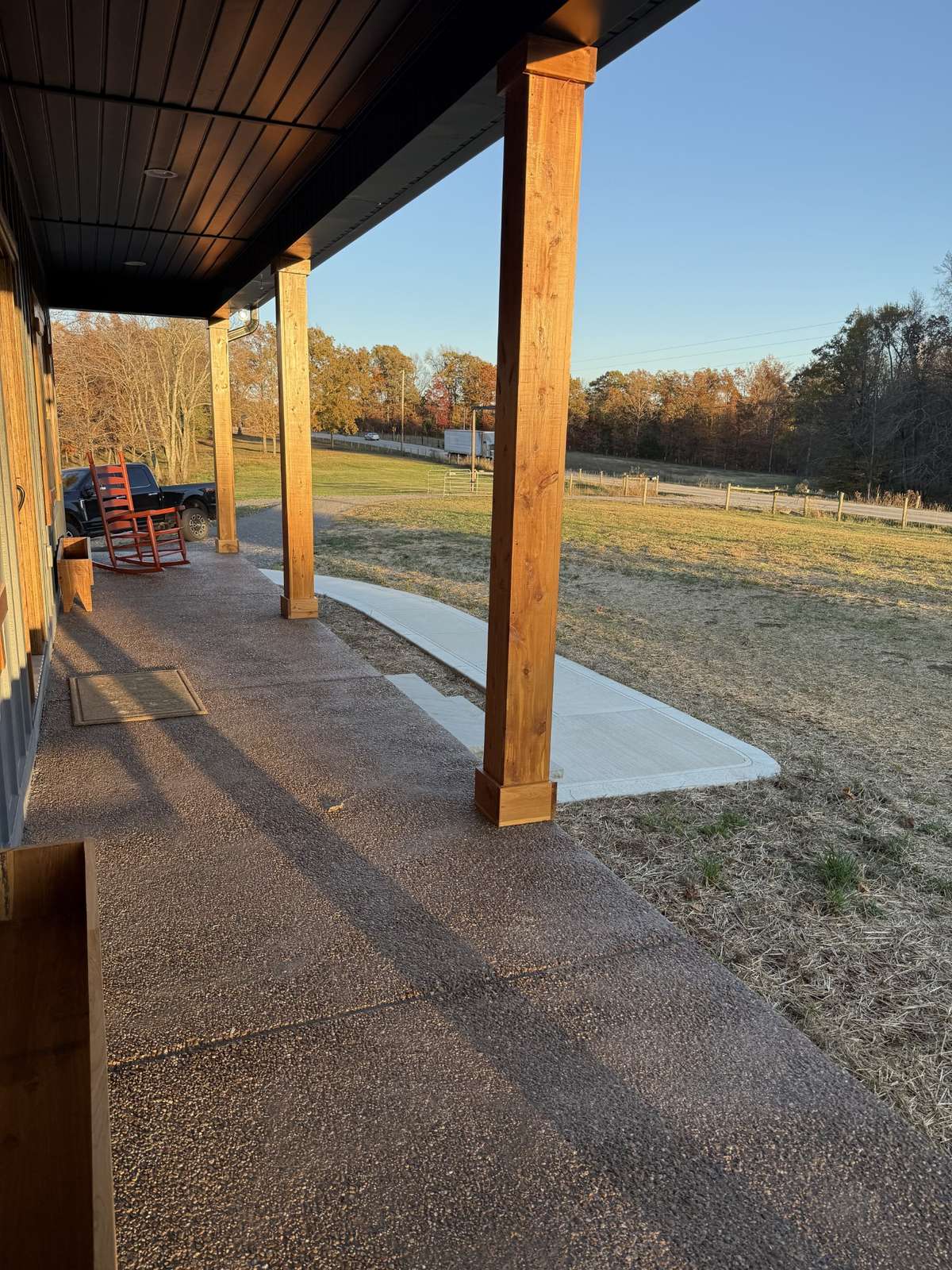 Front Porch and concrete sidewalk