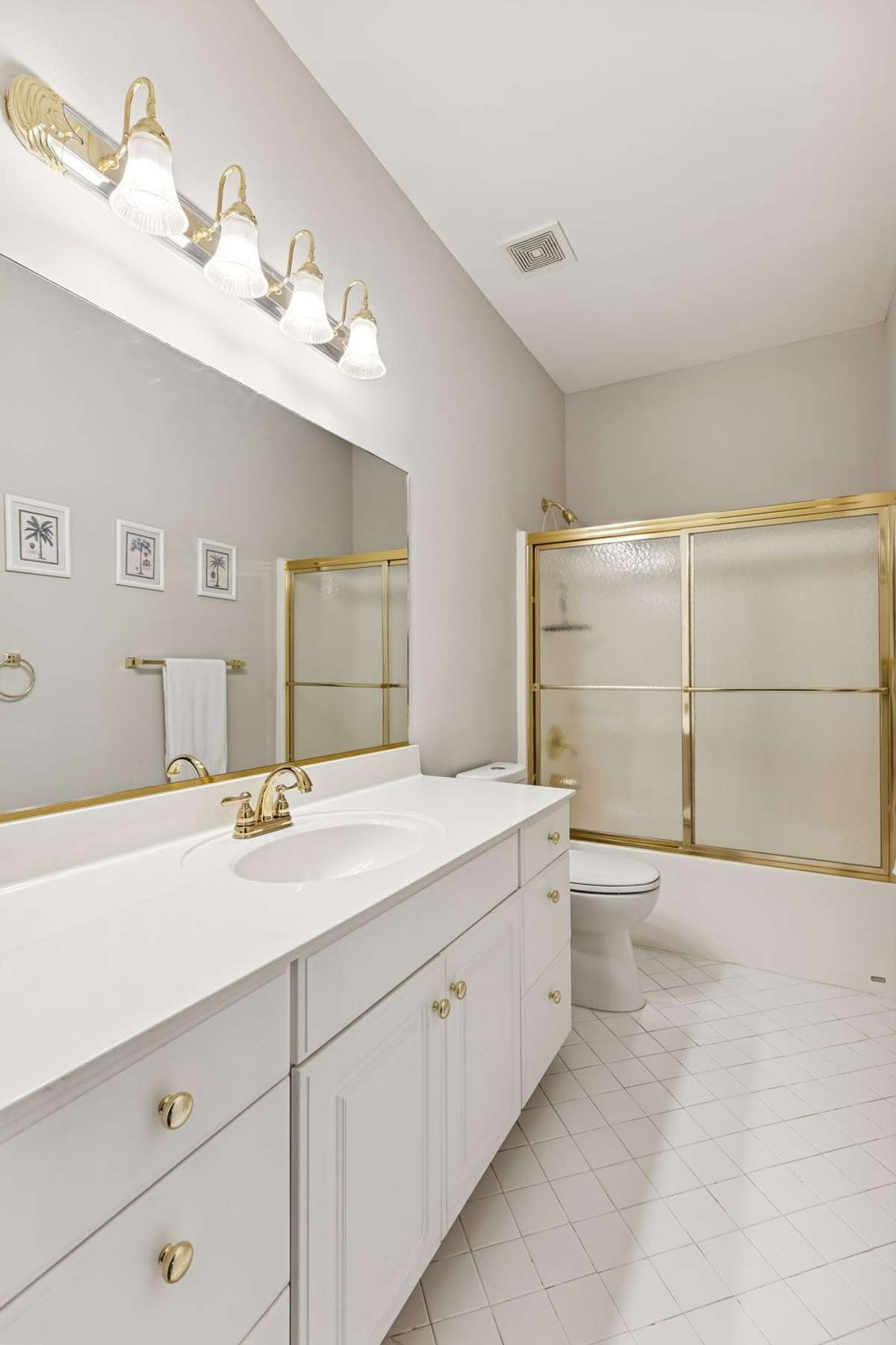 Guest bath features and extra long vanity with plenty of storage, tiled floor, and an enclosed tub/shower! 2409 Amber Glen Court, Murfreesboro, TN 37128