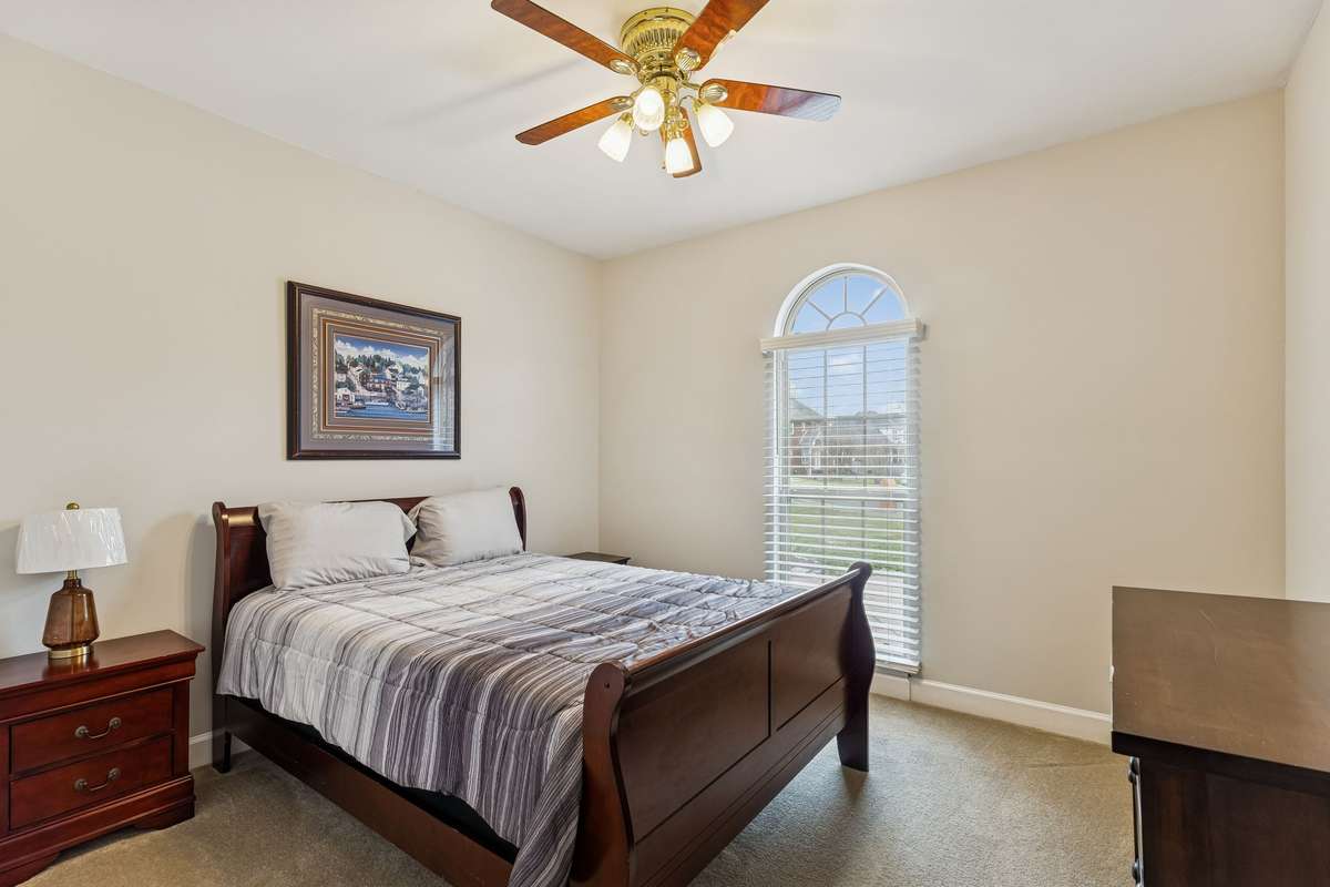 Secondary bedroom with plush carpeting, ample closet, and large window! 2409 Amber Glen Court, Murfreesboro, TN 37128