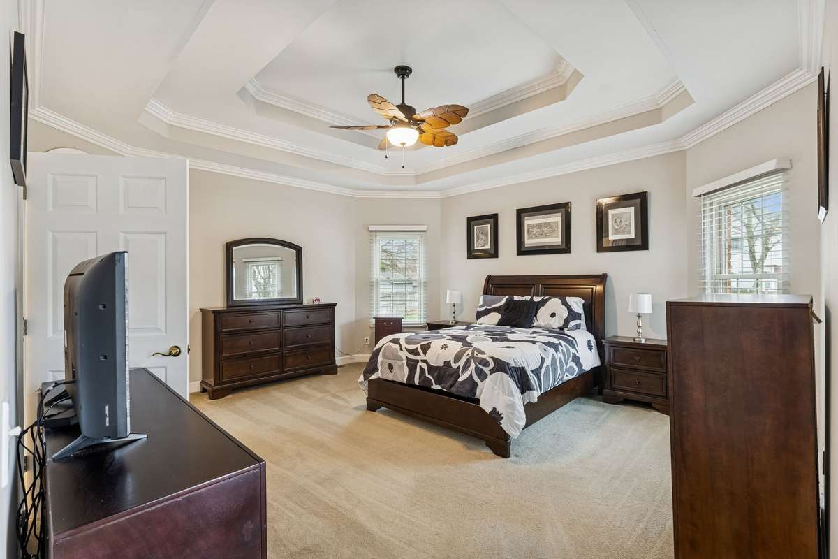 Large windows bring in natural light, while the private ensuite bath offers comfort and convenience just steps away, making this a true retreat! 2409 Amber Glen Court, Murfreesboro, TN 37128