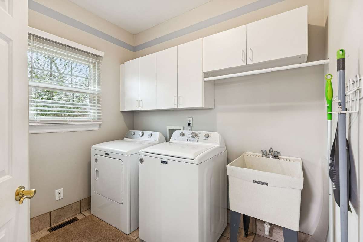 Roomy utility room with Maytag washer and dryer included and just a couple of years old with warranty! 2409 Amber Glen Court, Murfreesboro, TN 37128