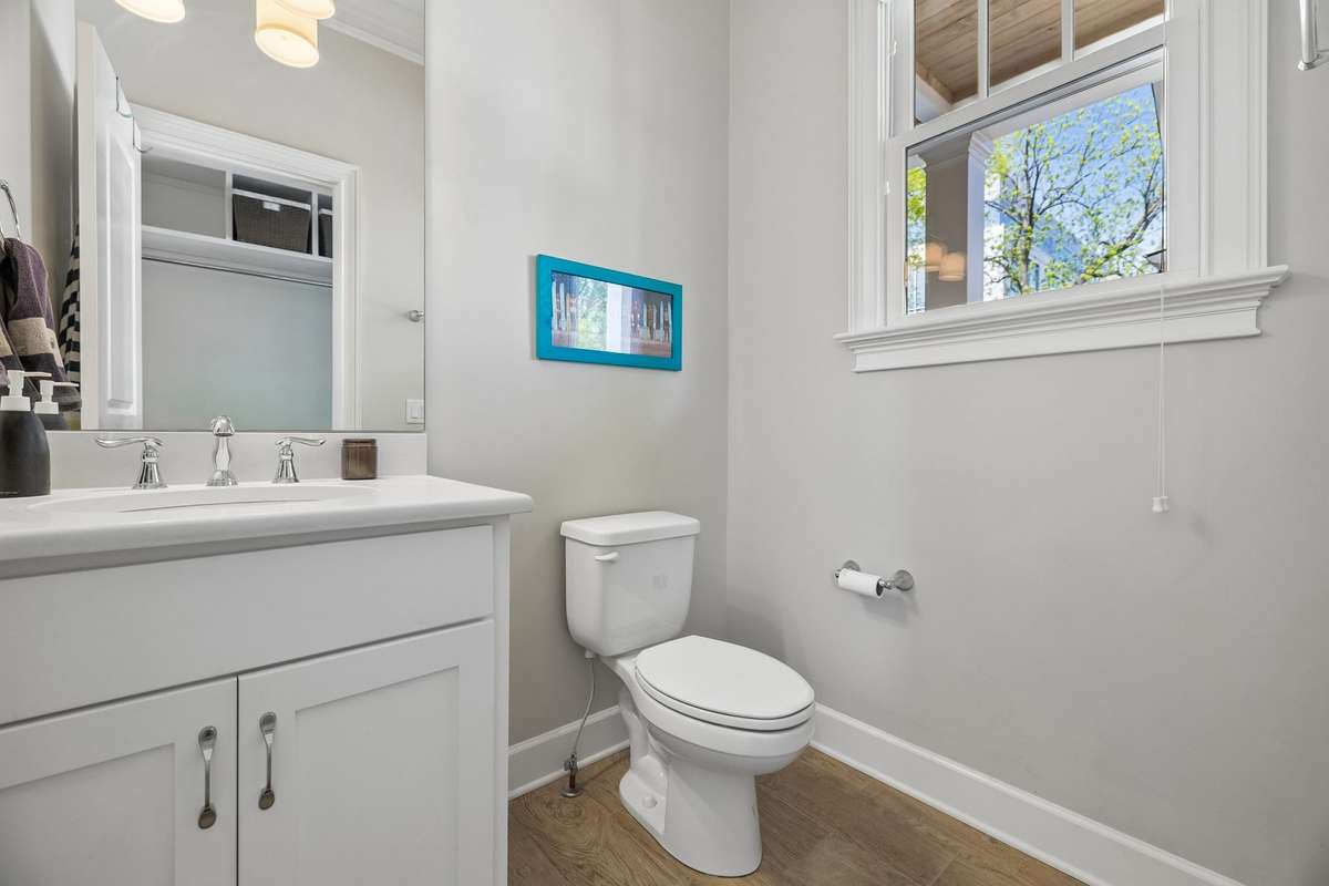 1/2 bath in the mudroom area is convenient for pool parties.