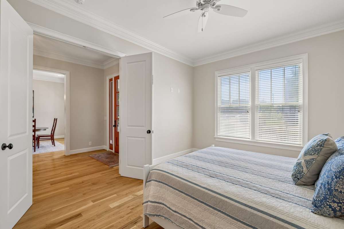 1st floor guest suite with private bath, & walk in closet.