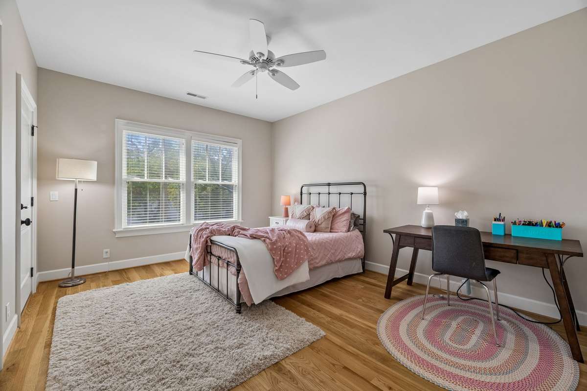 Bedroom 4 is a generous size (12x21) and has balcony access and a private bathroom.