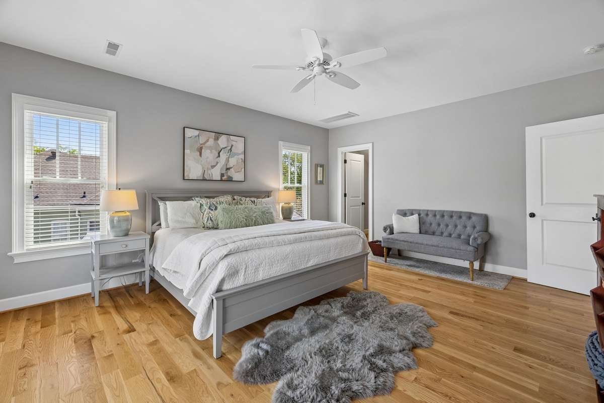 The primary suite is a generous size 15x 19 and has a private balcony, spa-like bathroom, huge walk in closet, linen closet, and an extra storage closet.