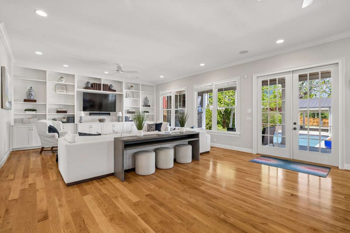 With 10-foot ceilings and lovely views, this expansive layout offers the perfect flow for high-end entertaining and seamless indoor-outdoor living.