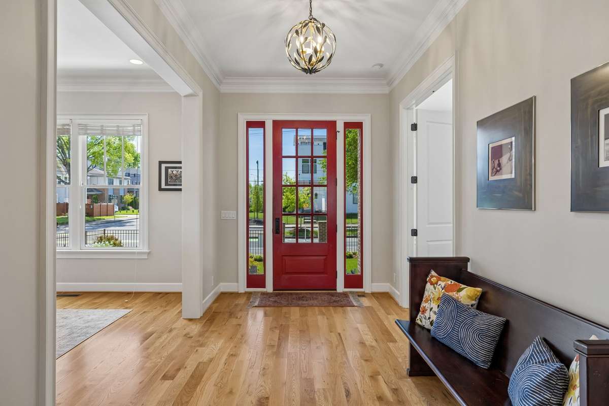 Gleaming hardwood floors run throughout the home.
