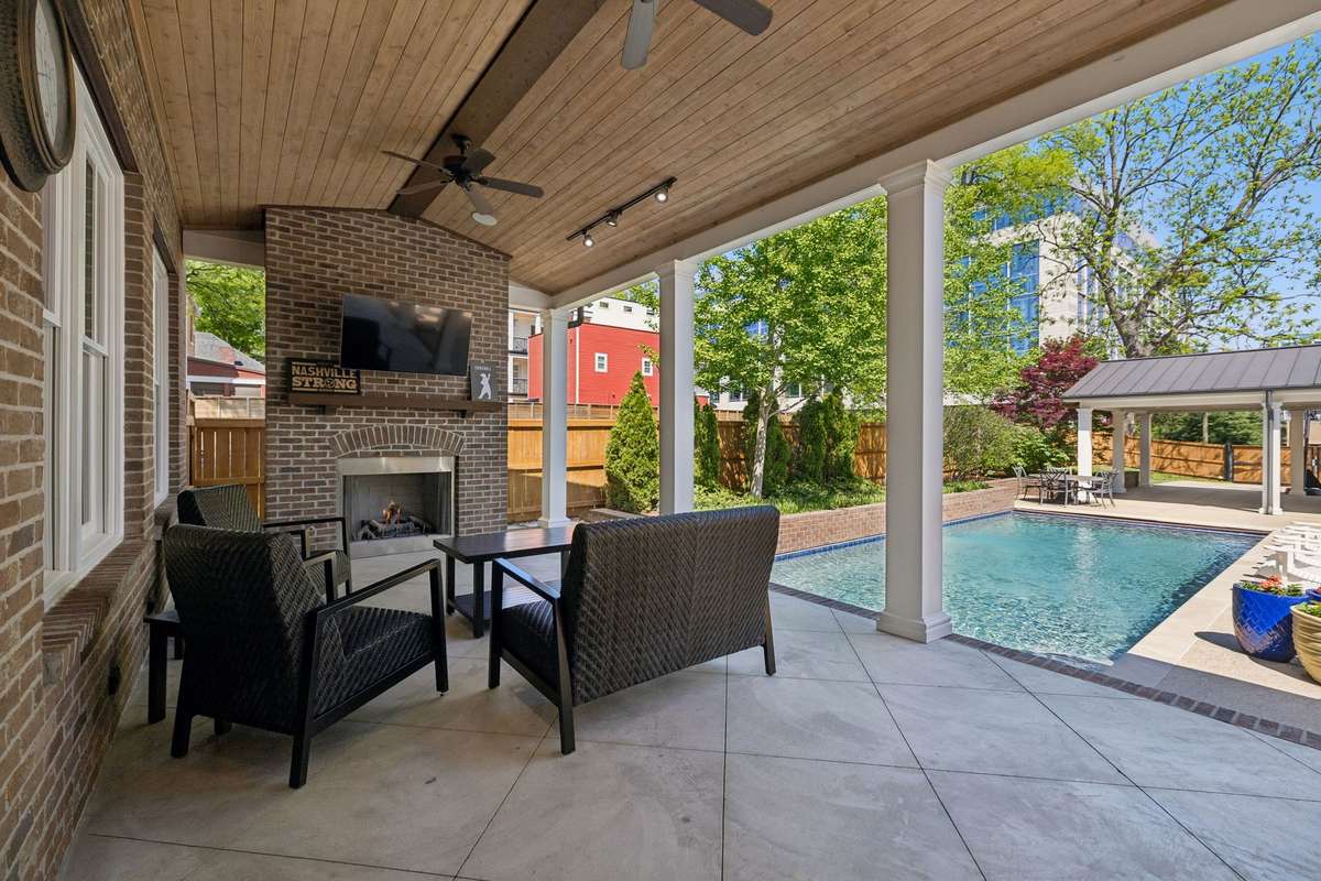 Begin your day with poolside yoga on the porch, where the warmth of the fireplace meets the morning air