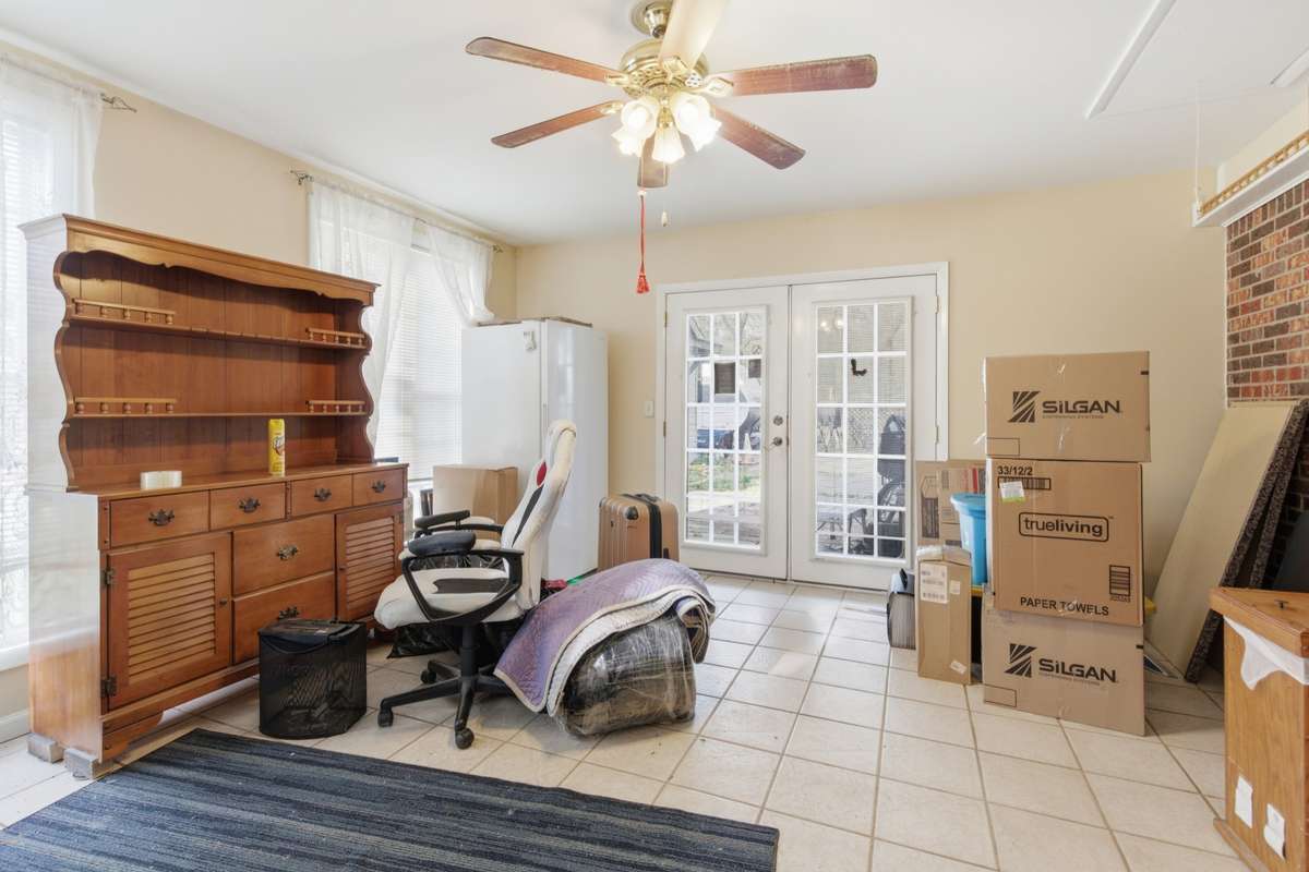 Sun room/flex room located off the kitchen in the back of the home.