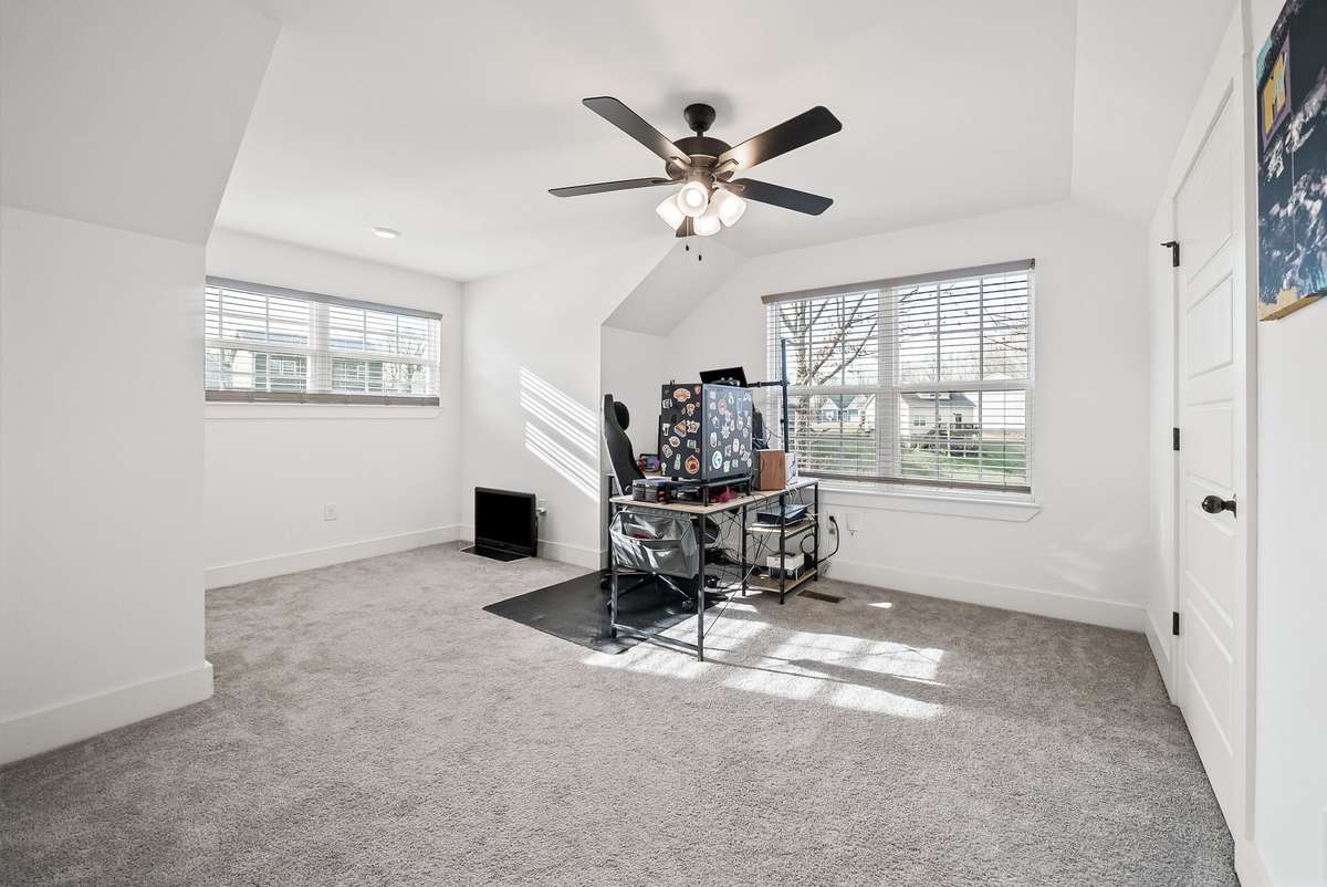 Second bedroom upstairs with large walk in closet