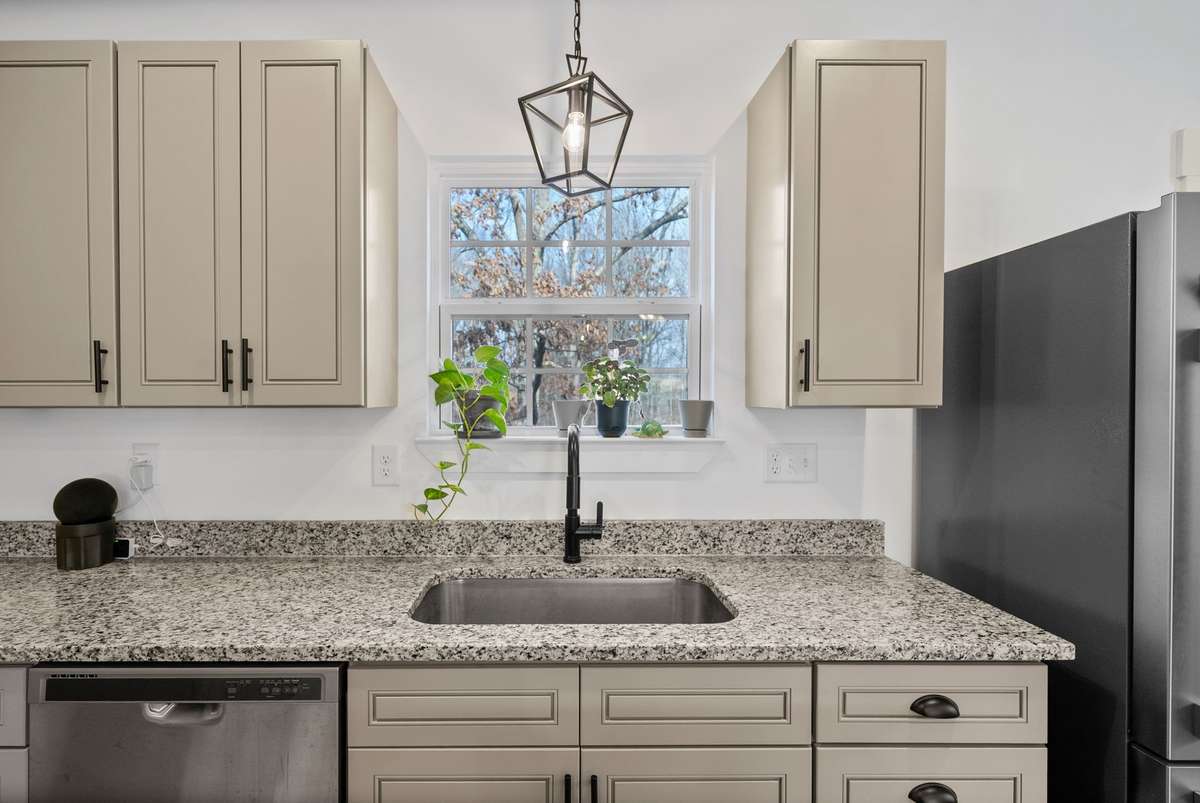 Granite countertops are a beautiful upgrade in this kitchen