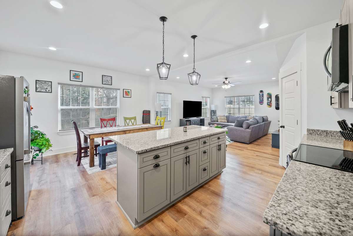 Plenty of natural light supported by modern fixtures and recess lighting in the home