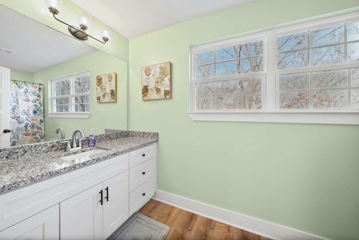 Upstairs bathroom with granite vanity