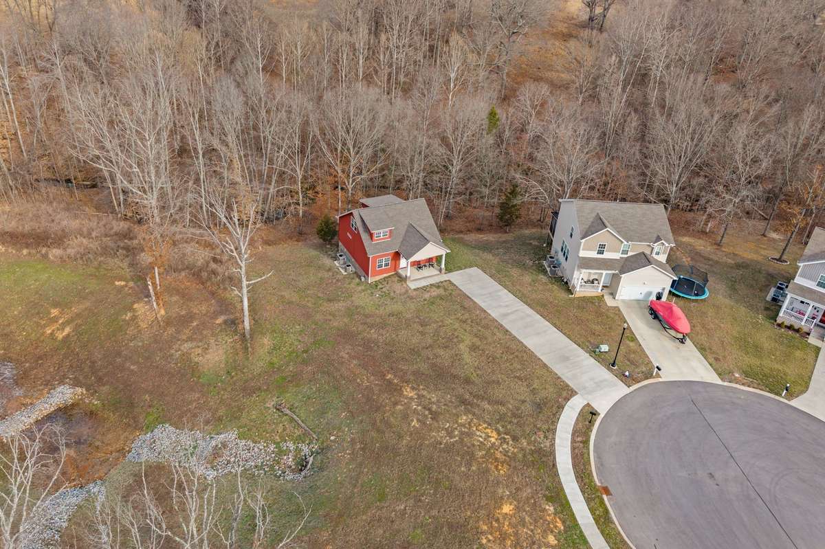 Enjoy the privacy you have in this cul de sac and wooded backyard.
