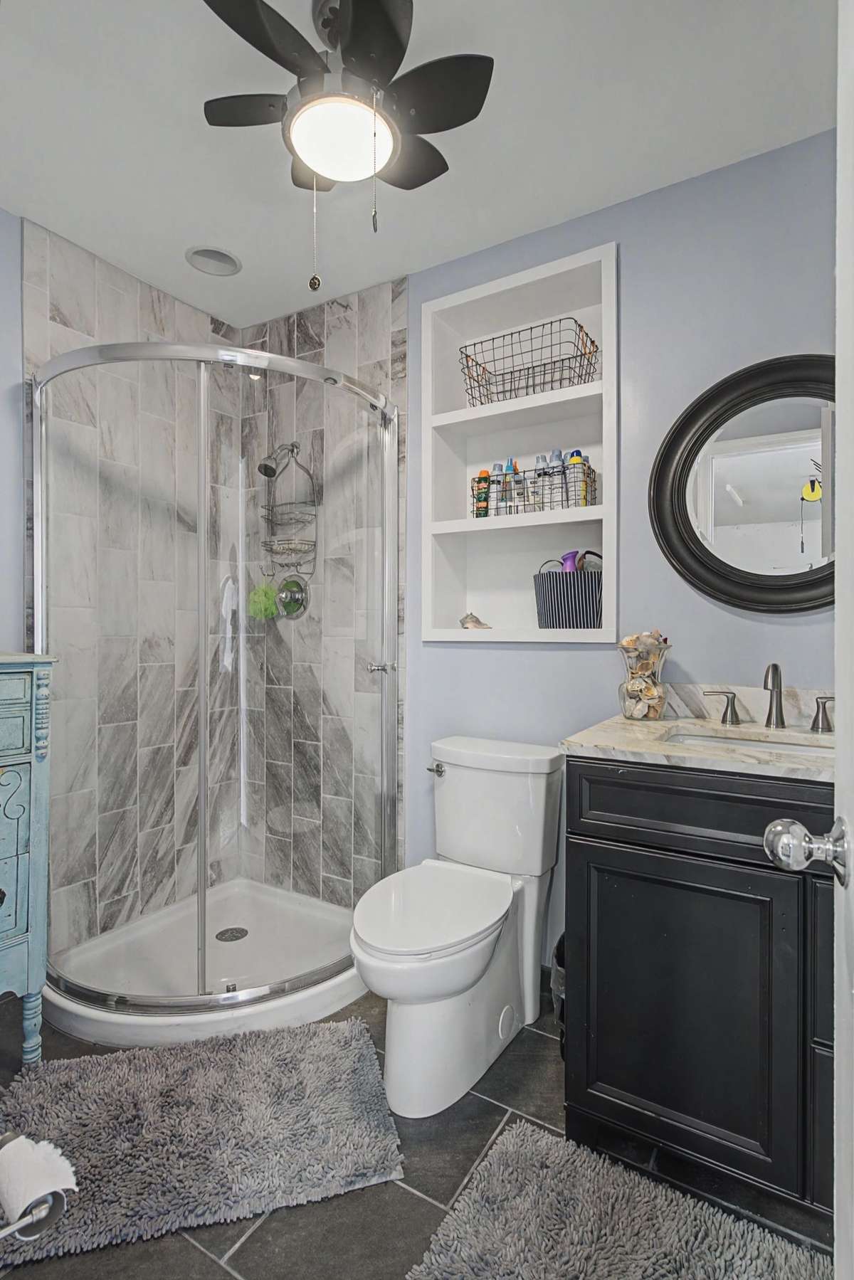 Shower/bathroom in garage for pool guest.
