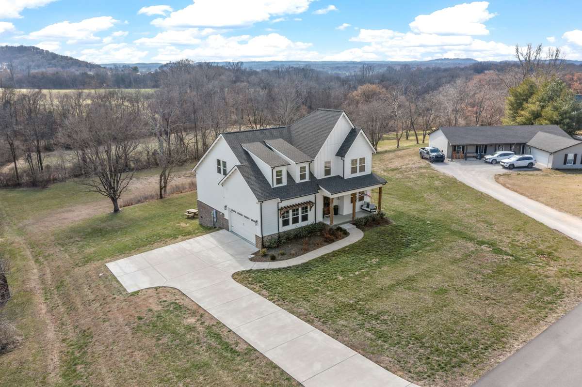 Another side aerial view of the home and the 2.24 acres.