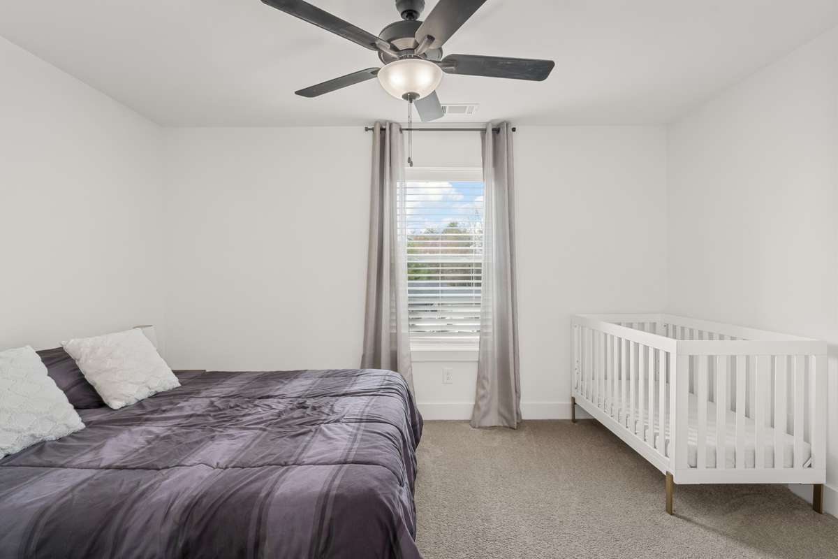 The third bedroom is located opposite side of the loft and off to the side of the home. This room has an extra suprise other than just a great closet in store.
