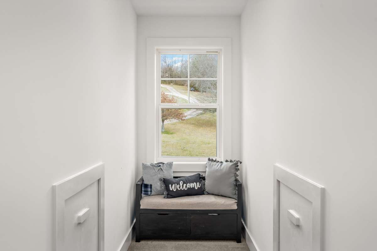 The small dormer area that could be used as a little reading nook, etc.