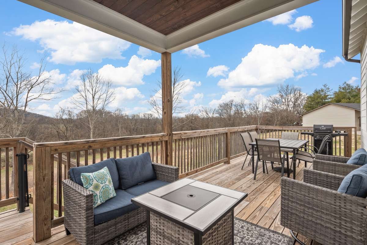 Do you want to sit on your deck and get some sun? This deck has the covered space and also has open space for grilling or getting a little sun.