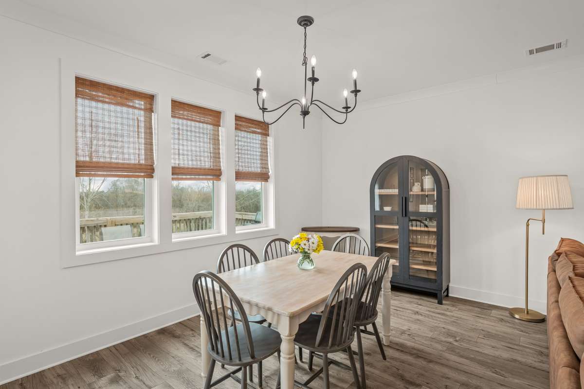 This dining room can accommodate a large dining table and additional furniure. The natural light in the room is fantastic!