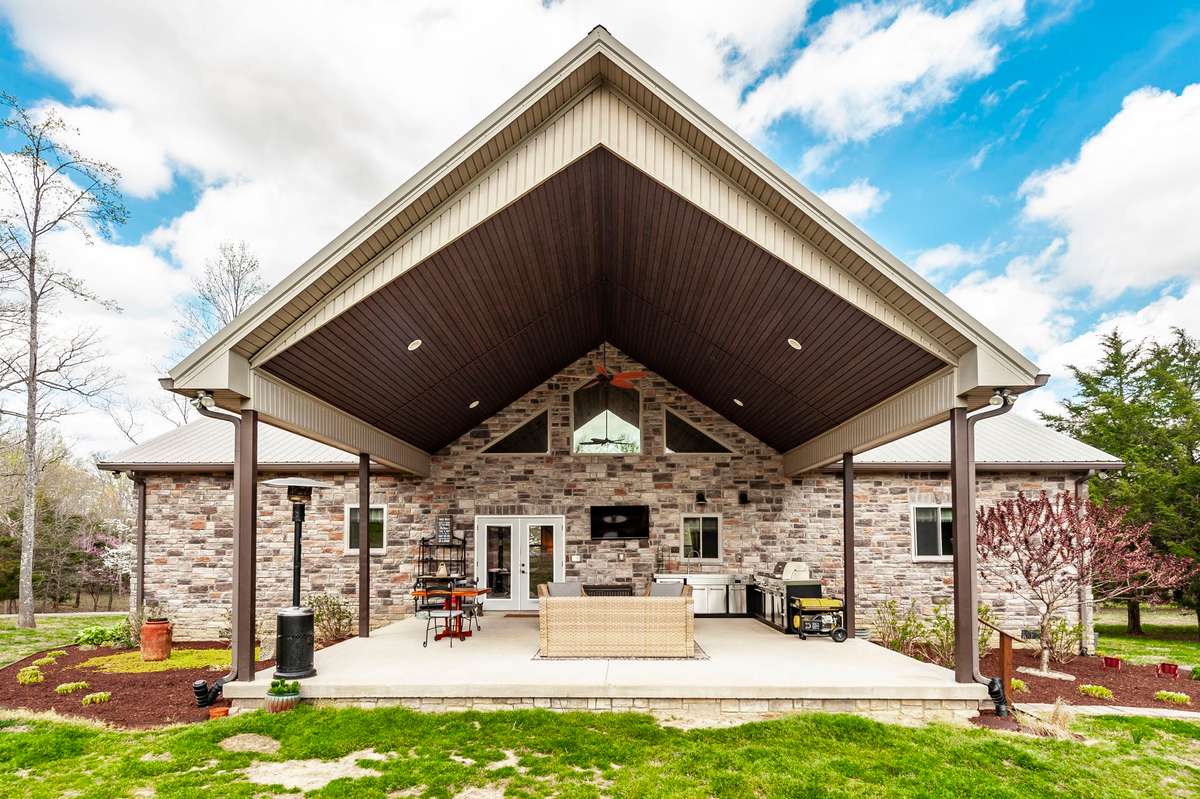 And just about as big as the Great Room, is a covered back porch with room for lounging, or eating dinner.