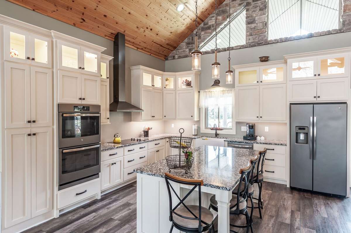 Double ovens and a huge island make this a great place for all of your baking.....