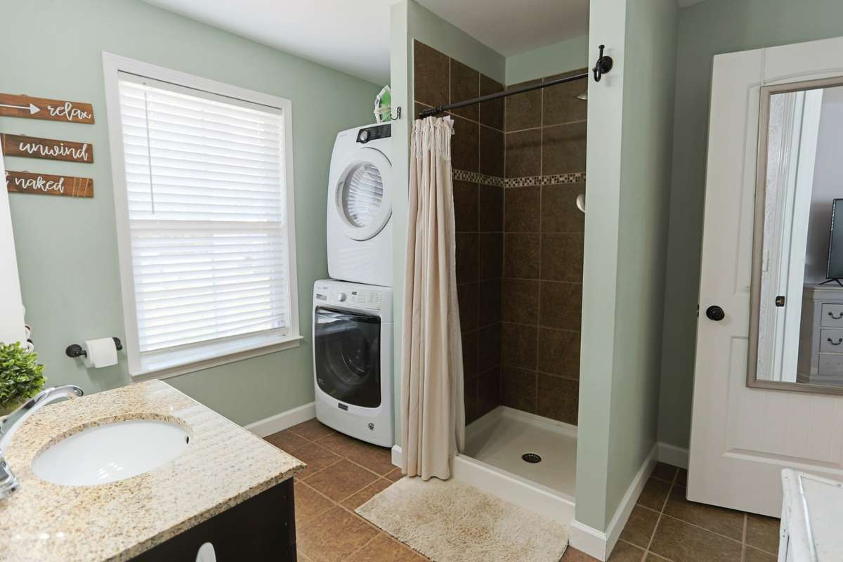 Convenience of laundry area/walk in shower together