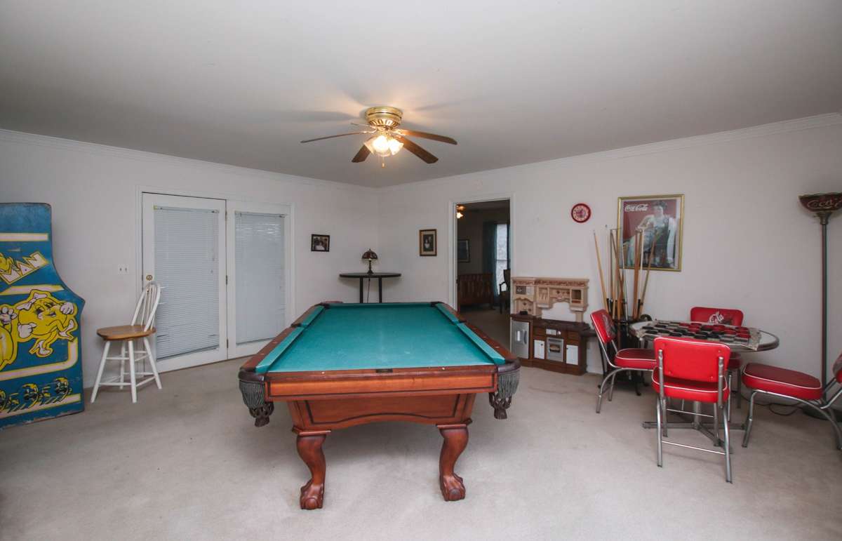 This bonus room is currently used as a game rooms but you can make it what you want. The closed door leads to the Florida room so you can enjoy the feel of being outside no matter what they weather is.
