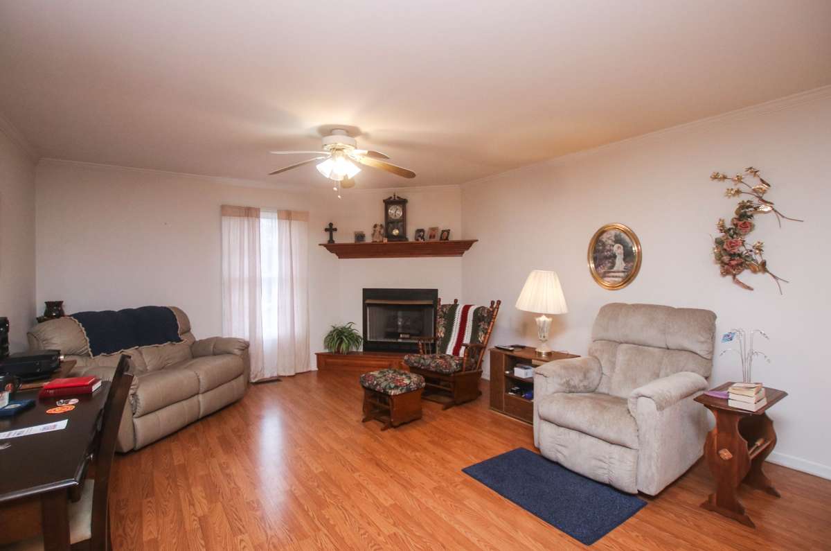 The fireplace has a cozy gas fireplace and lots of room for all your family and guests