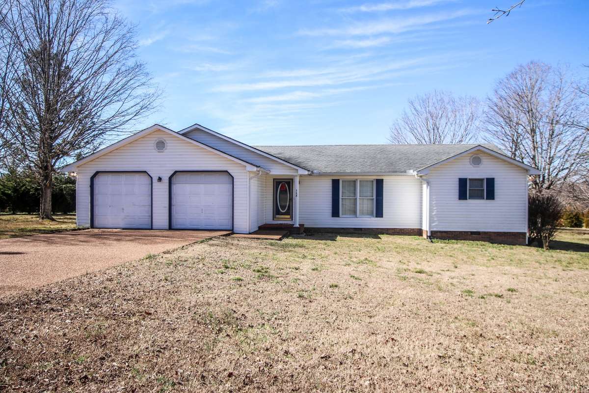 Another view of the home, Notice the aggregate driveway.